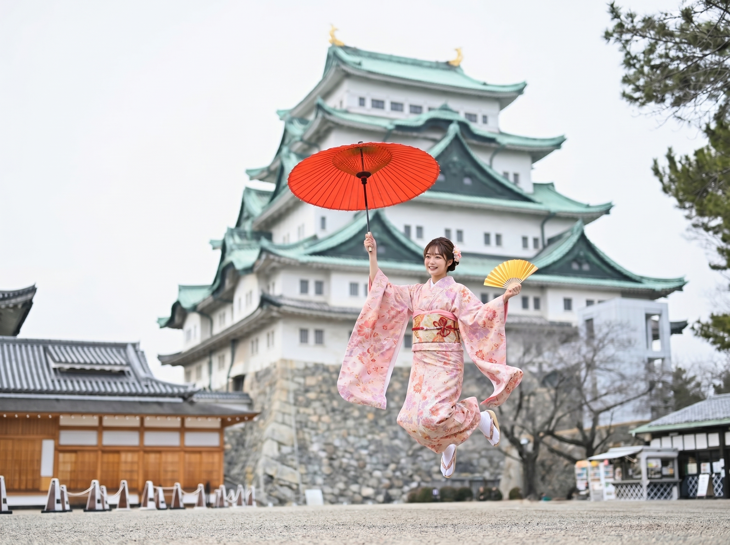 名古屋城を背景にジャンプする着物姿の女性 / Lady in kimono leaping with red parasol at Nagoya Castle